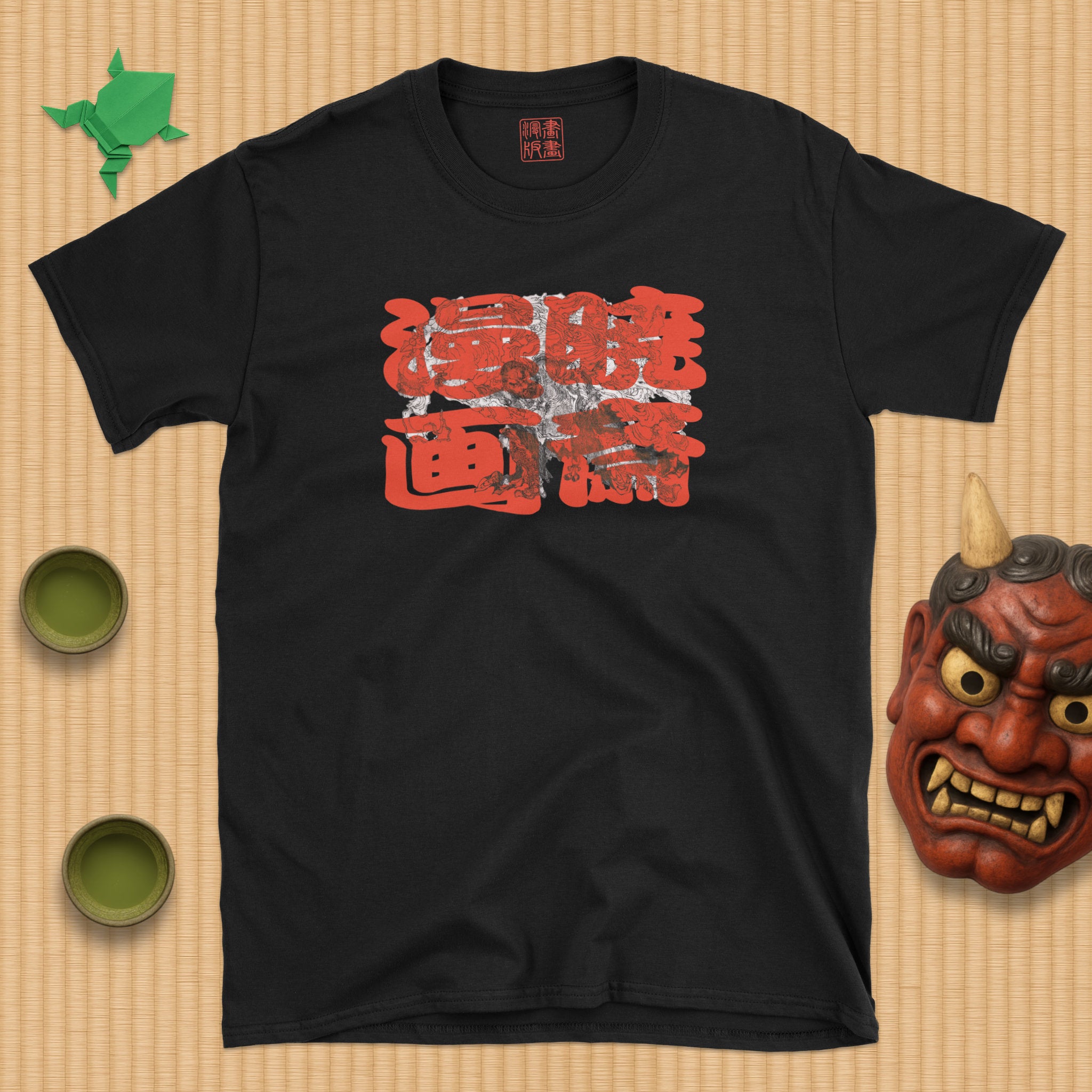 Kaoshō Rochishin hoisting a Guardian T-Shirt