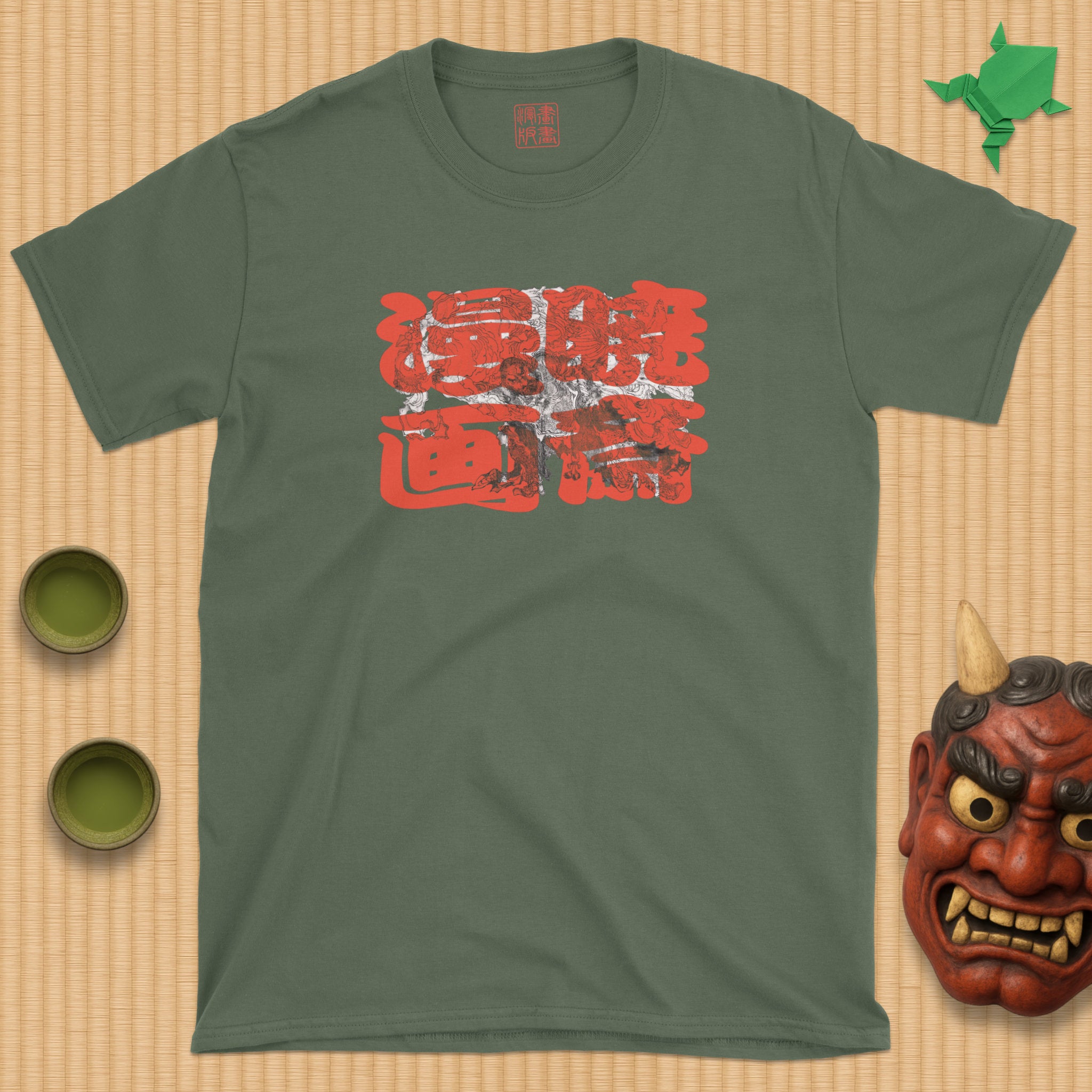 Kaoshō Rochishin hoisting a Guardian T-Shirt